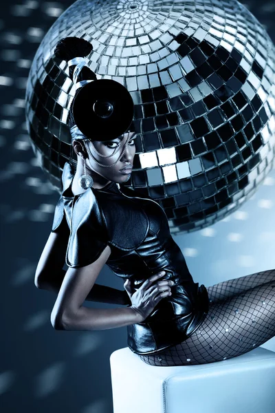 Attractive african woman with disco ball — Stock Photo, Image