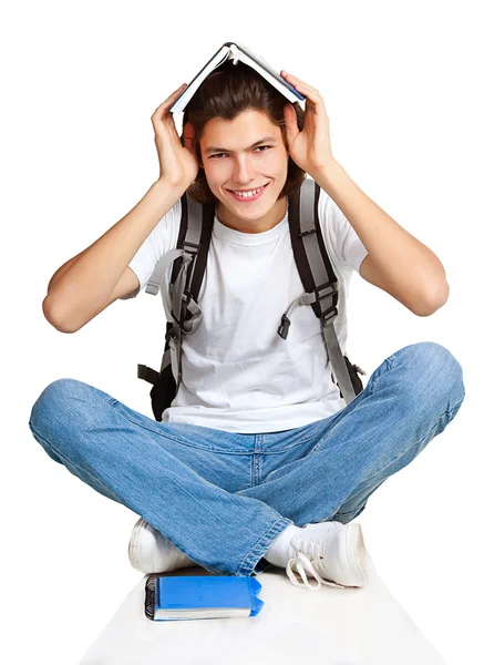 Student lärobok satchel sittande — Stockfoto