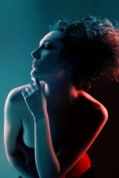 Model in red and green light — Stock Photo, Image