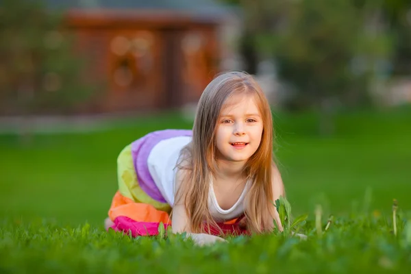 Cute little girl having fun in summer park — Stock Photo, Image