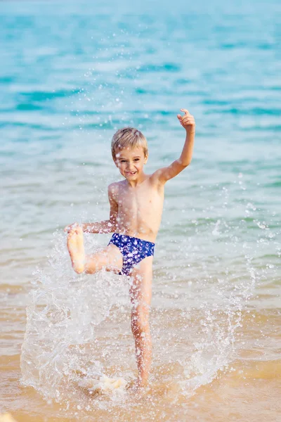 Happy boy in the sea — Stock Photo, Image