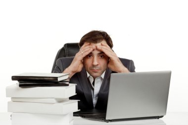 Business man in his office tired clipart