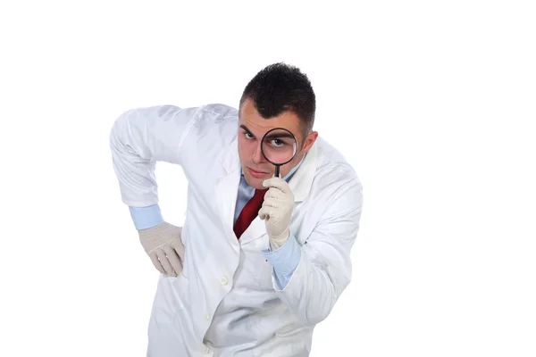 Doctor and magnifying glass — Stock Photo, Image