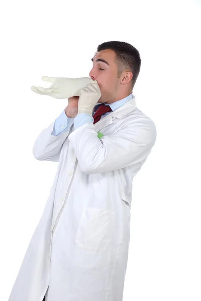 Young doctor and glove — Stock Photo, Image