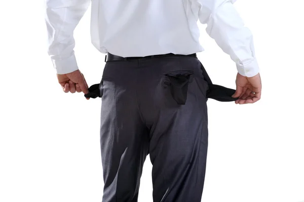 Homem de negócios mostrando seus bolsos vazios — Fotografia de Stock