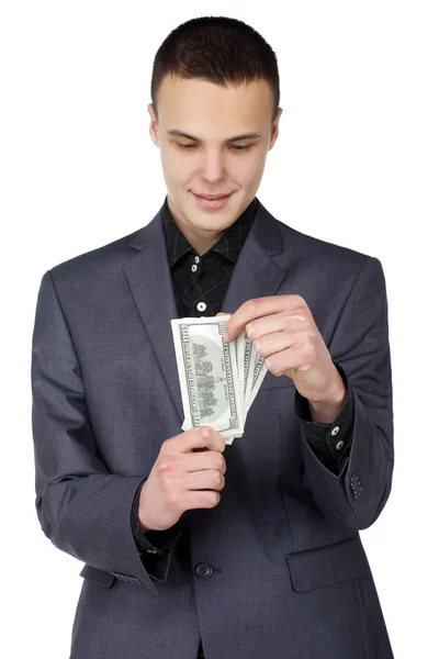 Joven hombre de negocios y dólares — Foto de Stock