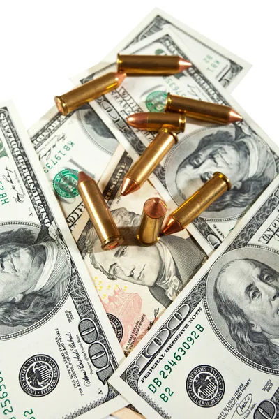Bullets and dollars — Stockfoto