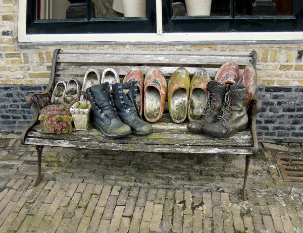 Old boots gallery — Stock Photo, Image