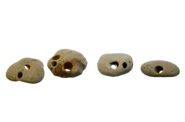 Cztery kamienie perforowane — Zdjęcie stockowe