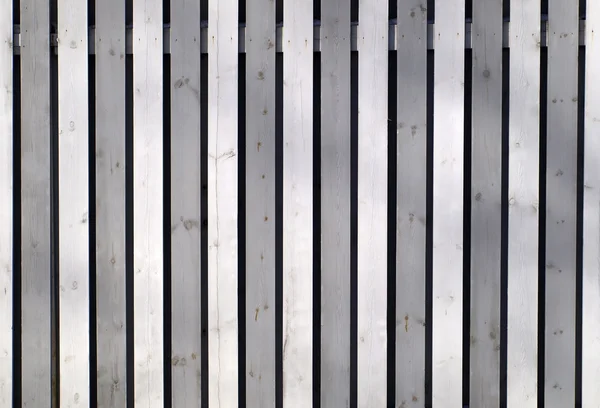 Grijze houten hek — Stockfoto