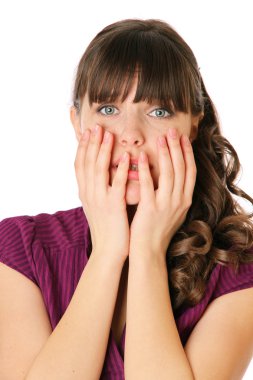 Frightened girl buries her face by hands clipart