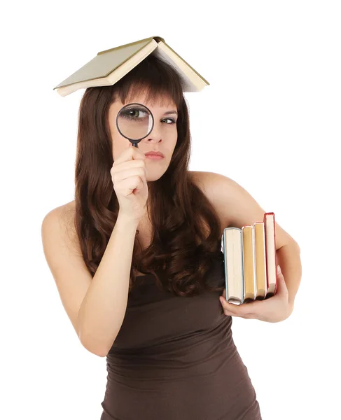 Girl student with books and magnifying glass — Stock Photo, Image