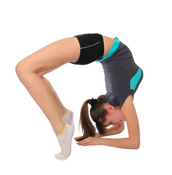 Tonårsflicka i gymnastik poser — Stockfoto