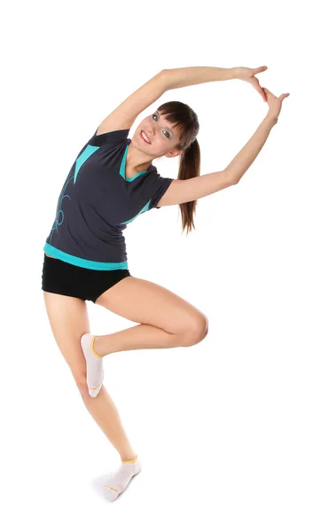 Девушка в гимнастических позах — стоковое фото