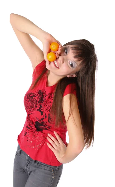 Lachende meisje met mandarijnen — Stockfoto