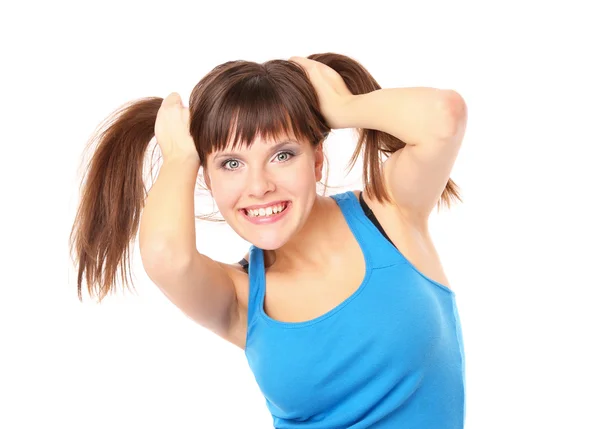 Vrolijke en vrolijk meisje klampt zich vast aan haar haren — Stockfoto