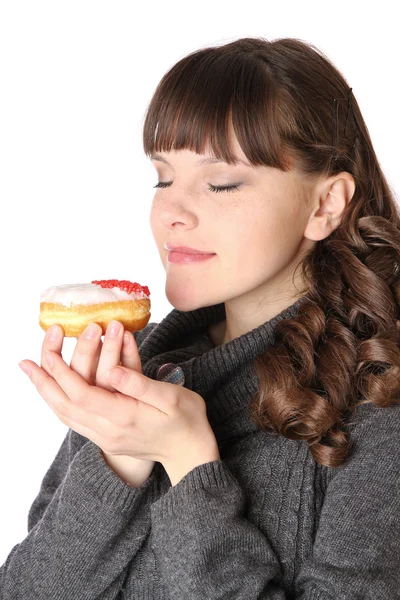 Frau im grauen Kleid mit Donut — Stockfoto