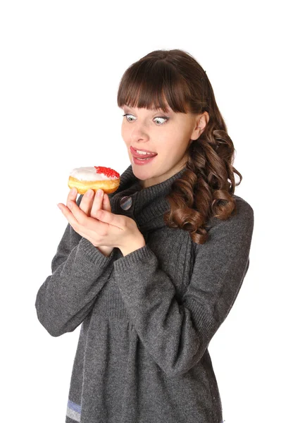 Mulher em vestido cinza com donut — Fotografia de Stock
