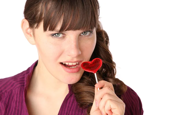 stock image Girl with a heart-shaped candy