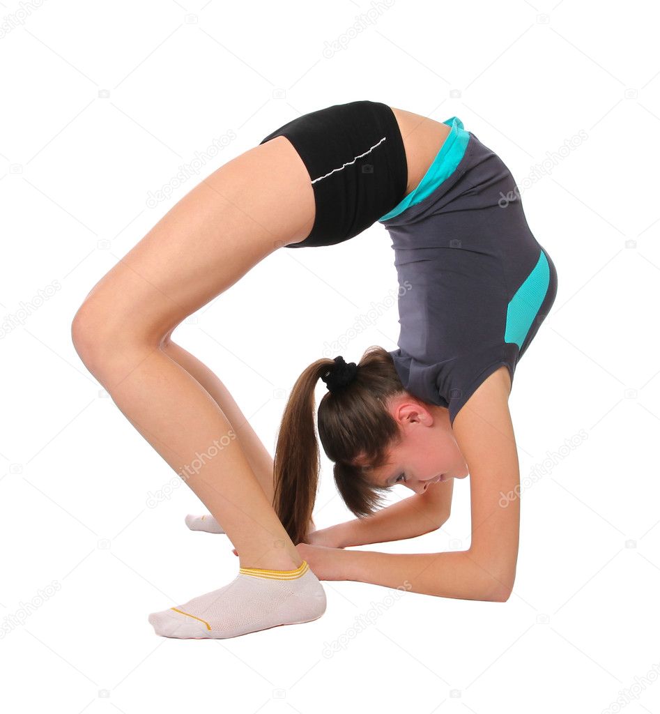 Little gymnast demonstrates flexibility and balance in a gymnastic pose  Stock Photo by ©fotonikola 468884628
