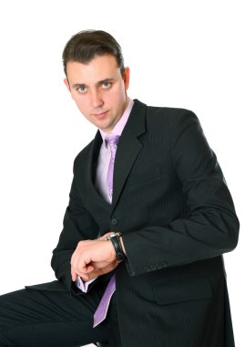 Businessman looking at his watch clipart