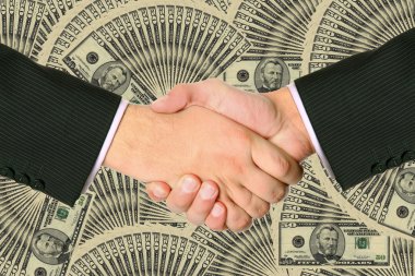 Business transaction is backed by a handshake clipart