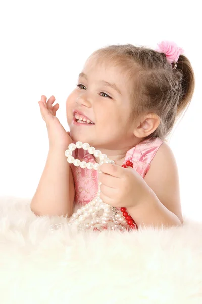 Kis baba lány álmodik gyöngyökkel — Stock Fotó
