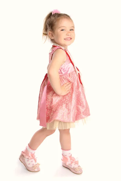 Dívka v růžových šatech, tanec — Stock fotografie