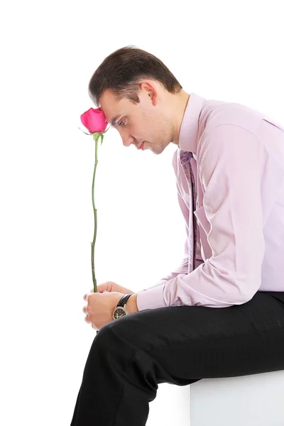 Un gars avec une rose rouge — Photo