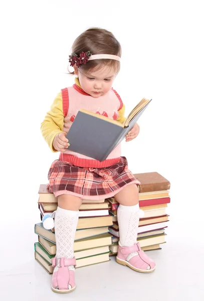 Little girl reading a book — Stock Photo, Image