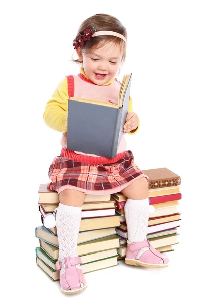 Bebé pequeno com muitos livros — Fotografia de Stock