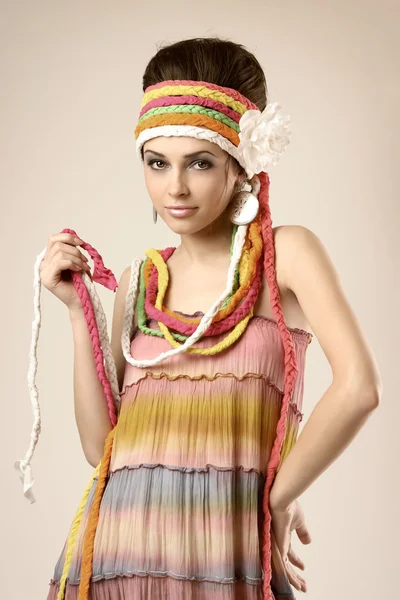 With colored braid around her head — Stock Photo, Image