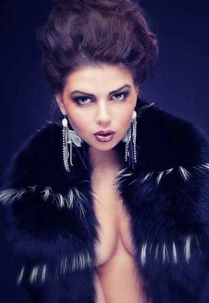 Naked girl in a fur coat — Stock Photo, Image