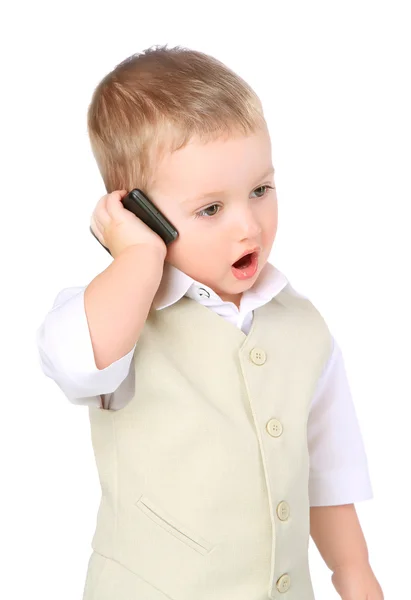 Liten pojke med en mobiltelefon — Stockfoto