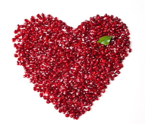 stock image Placer garnet grains in the shape of a heart