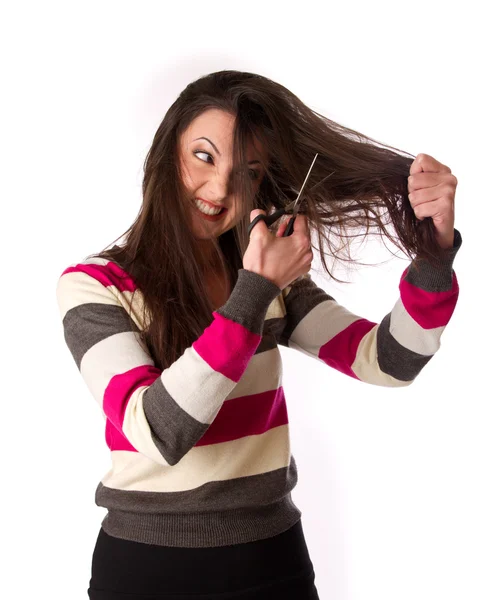 La mujer se peina el pelo. — Foto de Stock