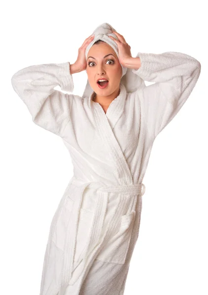 Woman in bathrobe is surprised — Stock Photo, Image