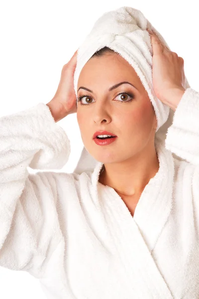 Woman in bathrobe is surprised — Stock Photo, Image
