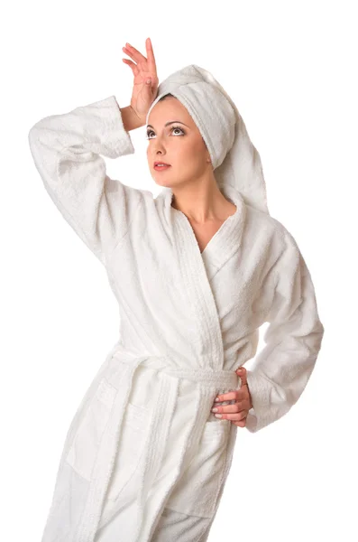 Vrouw in badjas is poseren — Stockfoto