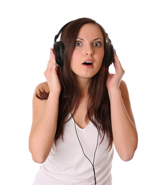 stock image Teenage girl listening music on headphones