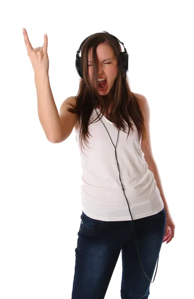 stock image Teenage girl listening music on headphones