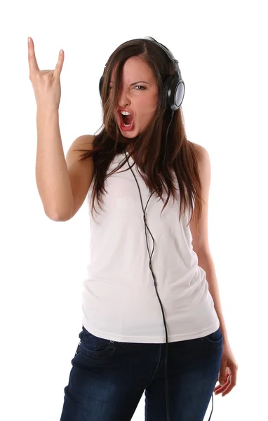 stock image Teenage girl listening music on headphones