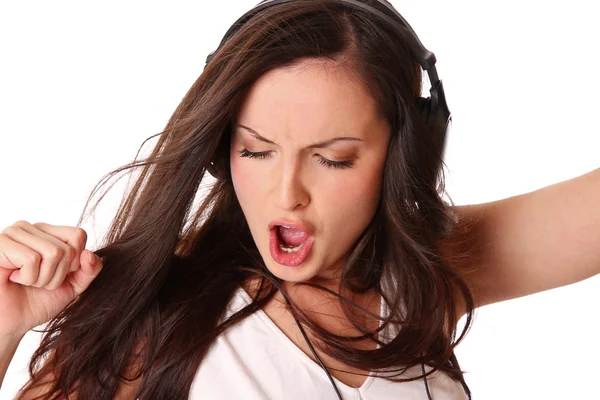 stock image Teenage girl listening music on headphones