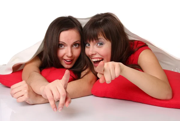 Two teenage girls are showing to us — Stock Photo, Image