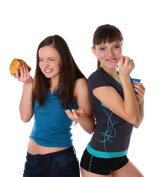 Gordura e meninas magras comendo — Fotografia de Stock