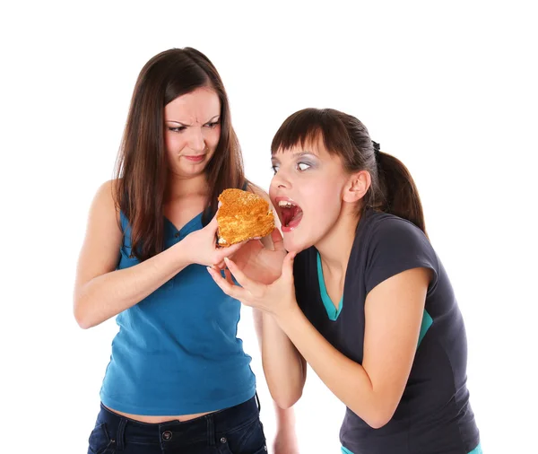 胖与瘦的女孩吃 — 图库照片