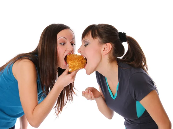 Толстые и худые девушки едят — стоковое фото
