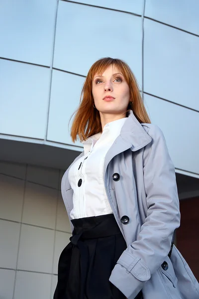 Office style woman is staying near the building — Stock Photo, Image