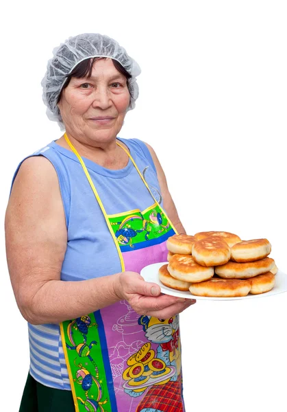 La donna con un piatto di torte Foto Stock Royalty Free