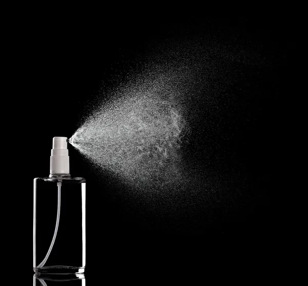 Botella de aerosol gota de perfume líquido —  Fotos de Stock
